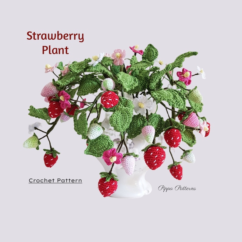 May include: A crocheted strawberry plant with red, pink, and white strawberries and flowers. The plant is in a white vase and the text "Strawberry Plant" and "Crochet Pattern" are visible.