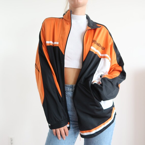 chaqueta reebok naranja
