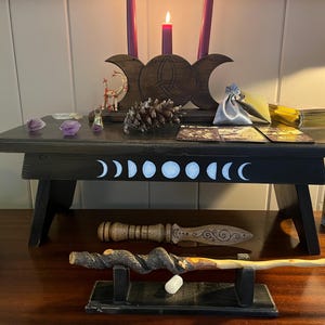 Foldable wooden altar. Black with moon phases.