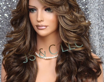 Human Hair Blend Long Full Luscious Heat OK Wavy Wig with Romantic feathered sides Bangs layers of Beautiful Brown Caramel and Blonde mix