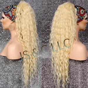 May include: A long, blonde, curly ponytail hairpiece with a patterned headband. The hairpiece is styled in a high ponytail and is worn on a mannequin head.