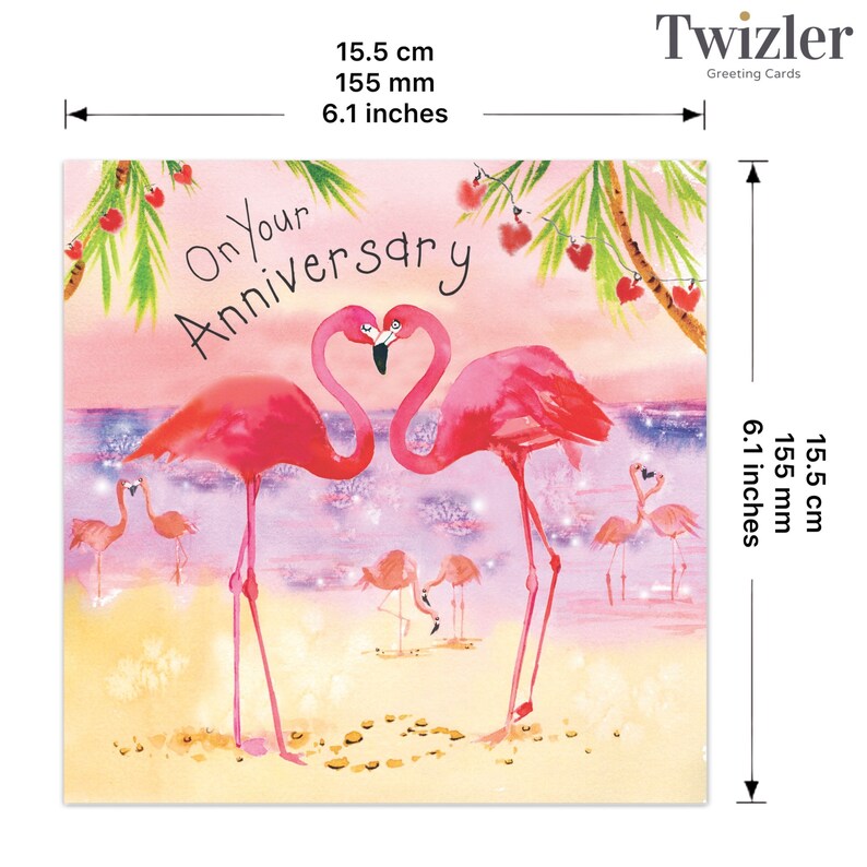 May include: A greeting card featuring a pink flamingo couple with the text "On Your Anniversary" in black script. The flamingos are standing on a beach with palm trees and a pink and purple sky in the background.