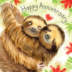 May include: Two sloths hugging each other with the text "Happy Anniversary" in a whimsical font. The sloths are brown and furry with big eyes and are surrounded by green leaves and red flowers.