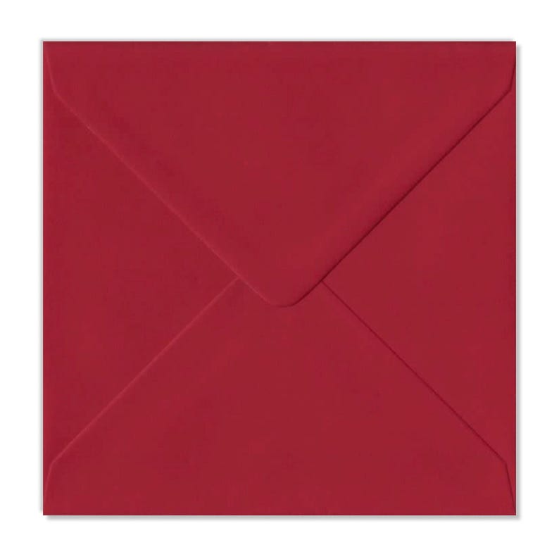 May include: A red envelope with a standard flap.