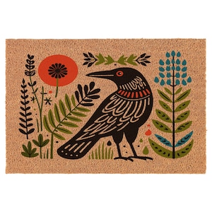May include: A rectangular doormat with a decorative design featuring a black crow, red poppy, and blue flowers. The crow has an orange eye and is surrounded by green foliage. The background is a natural brown color.