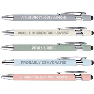 May include: A set of five retractable ballpoint pens with chrome accents and stylus tips. Each pen features a unique phrase: ASK ME ABOUT YOUR SYMPTOMS, PRIOR AUTHORIZATION SURVIVOR, VITALS & VIBES, PROBABLY DEHYDRATED, and CHART IT OR IT DIDN'T HAPPEN.