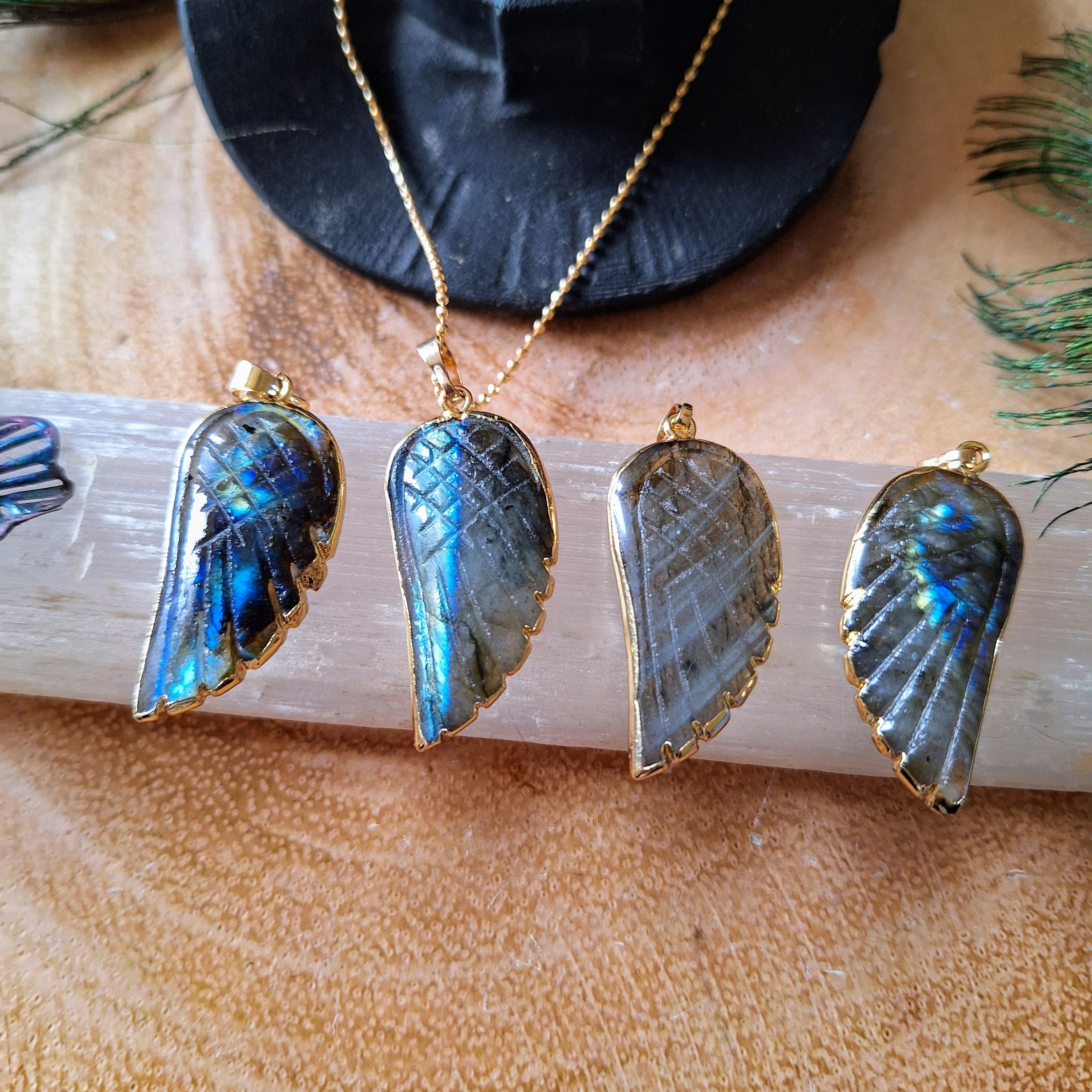Carved Labradorite Angel Wing Pendants Carved Labradorite Angel Wing Pendants