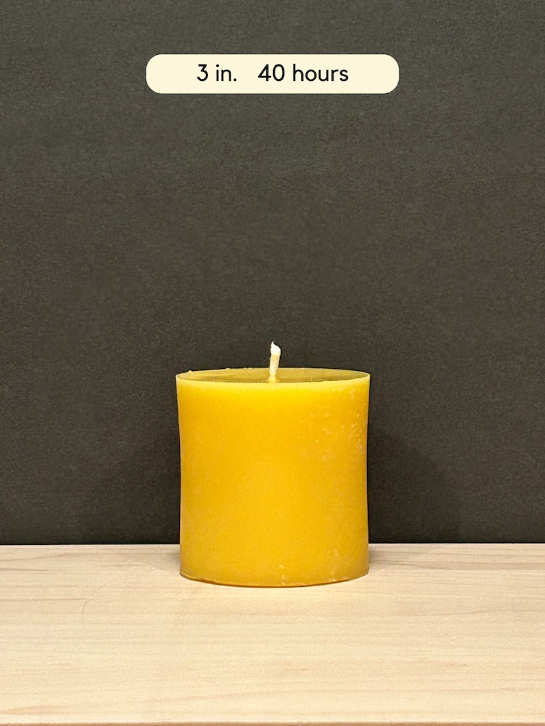 May include: A 3-inch diameter yellow beeswax candle with a burn time of 40 hours.