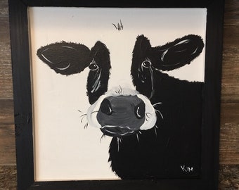 Black and white cow painting.  Framed.  14x14 inches