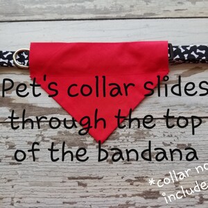 May include: Red bandana with a white and black bone print collar. The collar slides through the top of the bandana. *Collar not included*