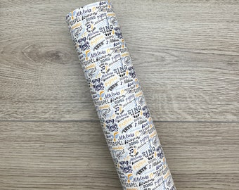 May include: White wrapping paper with a repeating pattern of blue and gold musical notes, crosses, and words like "Sing", "Alleluia", "Gospel", "Praise", and "Music".