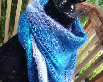 Light, warm shawl with different shades of blue.