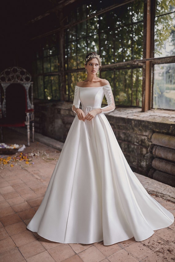 A-line Satin Wedding Dress ELIZA With Long Sleeves and Detachable Belt by  Ange Etoiles 