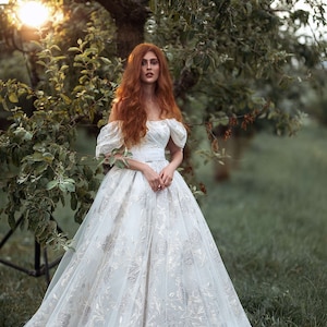 Princess wedding dress KEIRIS with off the shoulder sleeves and long train by Blammo-Biamo