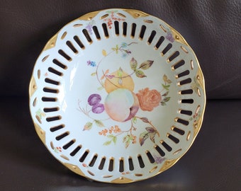 Antique porcelain bowl with pierced trim, gilding and transfer of flowers and fruit, decor Clarice and numbered