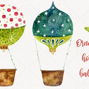 May include: Two watercolor painted hot air balloons shaped like Christmas ornaments. One balloon is green with white stars and the other is red and white with green polka dots. Both balloons have a gold trim and are attached to a brown basket.