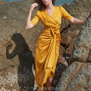 Amelia Mustard Satin Wrap Midi Dress with Puff Sleeves, Draped Rose Detail, Ruched Waist and V-Neck – Elegant Occasionwear