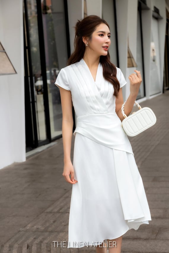 Elegant White Crepe Wrap Dress, Asymmetric Hem, Cap Sleeves Elegant White Crepe Wrap Dress, Asymmetric Hem, Cap Sleeves