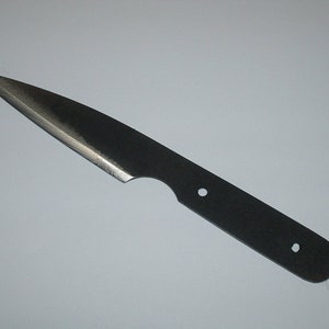 May include: A black knife blade with a rounded tip and a black handle with two holes. The blade is about 7 inches long.