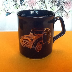 Citroen 2cv French car. Citroen 2cv mug - blue earthenware china. Tams Pottery, Staffordshire. Made in England. Individual design. 1990s.