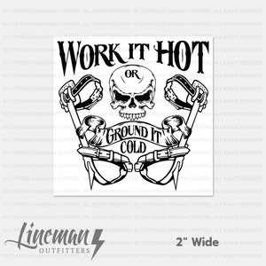 May include: Black and white graphic design featuring a skull with a banner that reads "Work it Hot or Ground it Cold". The design includes two climbing hooks.