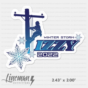 May include: A blue and white sticker with a silhouette of a lineman climbing a utility pole. The sticker also features a snowflake design and the text "Winter Storm Izzy 2022". The sticker measures 2.43 inches by 2.00 inches.