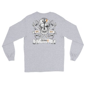 May include: Gray long-sleeve t-shirt with a graphic of a skull with crossed lineman tools. The skull has a lightning bolt and the text "EST. 2017" on a banner. The text "Lineman Outfitters" is on a banner below the skull.