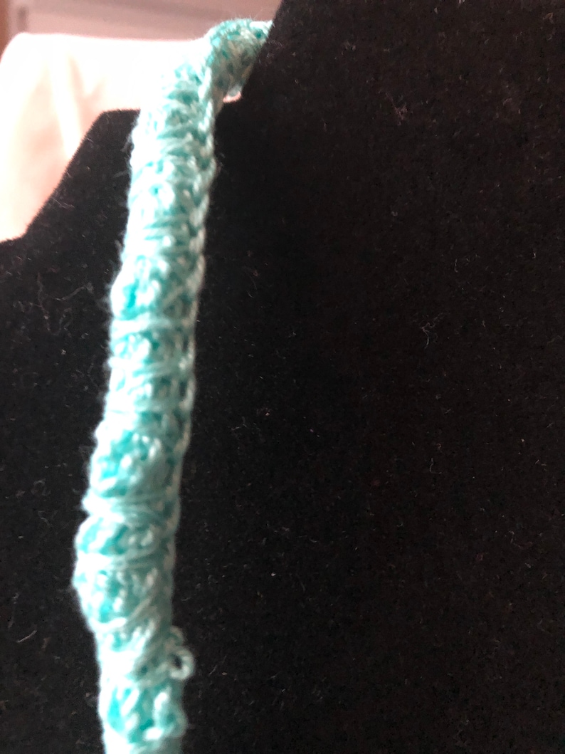 100/% cotton thread with Chengmu 4mm Bicone glass beads. Crocheted beaded multi strand necklace
