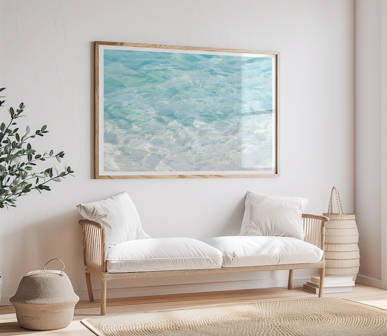 Turquoise water art print by Cattie Coyle Photography above couch. All rights reserved.