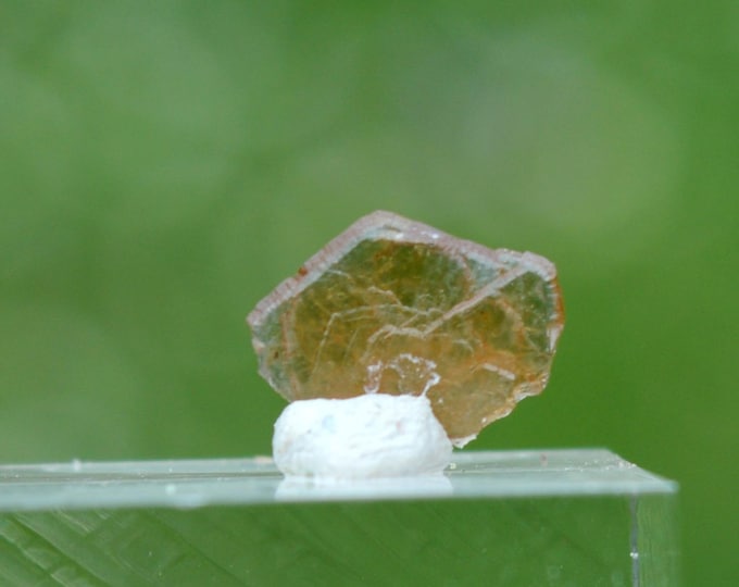 Bastnäsite 0.14 grams - Trimouns Talc Mine, Luzenac, Foix, Ariège, Occitanie, France