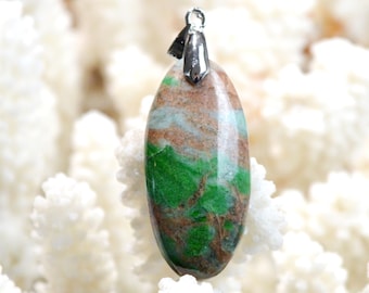 May include: A green and brown oval shaped pendant with a silver bail. The pendant is made of a natural stone with a unique pattern.