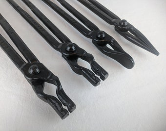 Blacksmith tongs forging metal working tong set. Flat jaw, scrolling, and two v-bit tongs forge anvil smithing