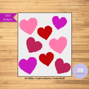 May include: A C2C pattern featuring pixelated hearts in shades of pink, red, and purple on a white background. The words "C2C Pattern" and "Written Instructions Included!" are also visible.
