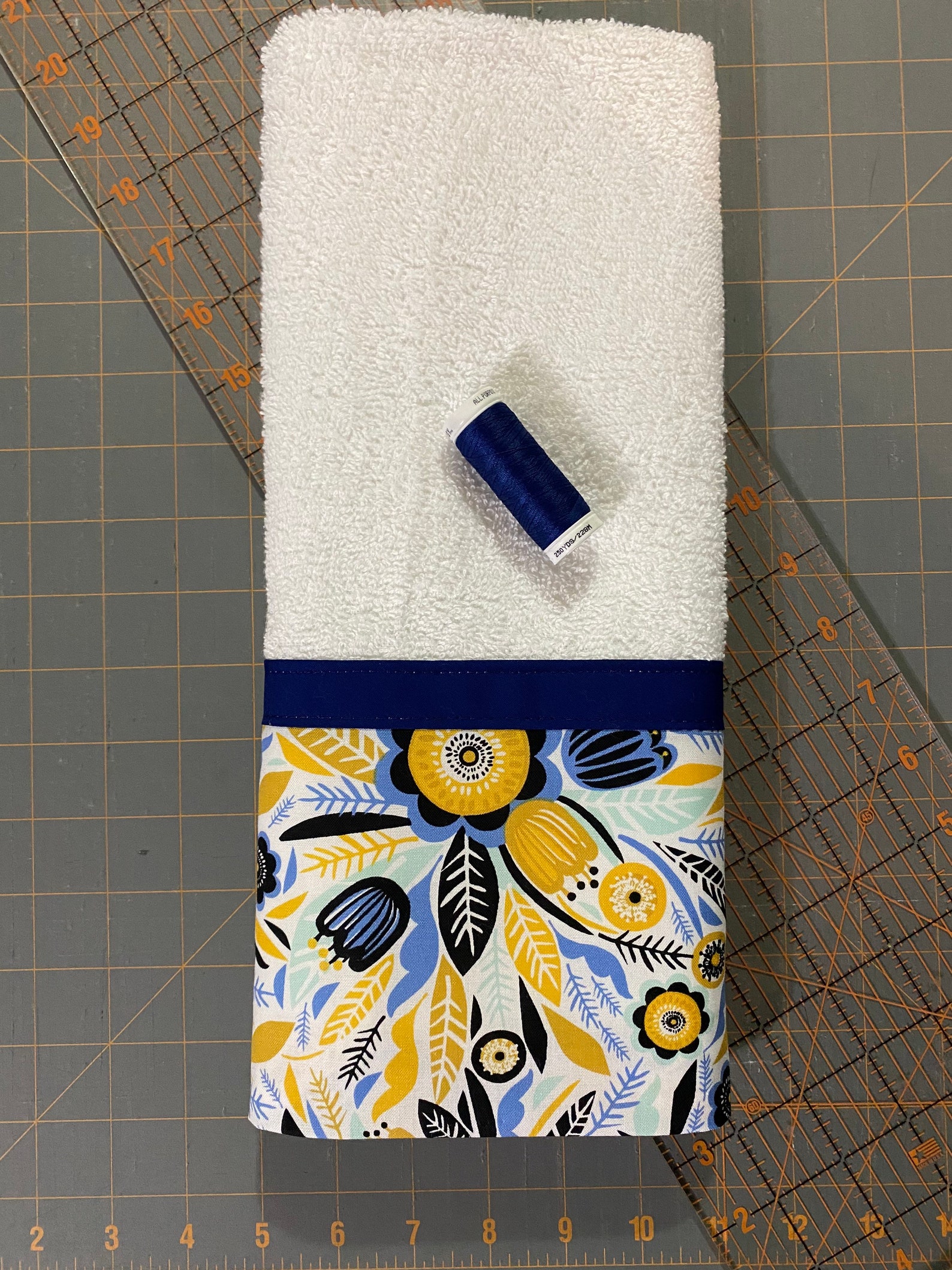 blue and yellow hand towels