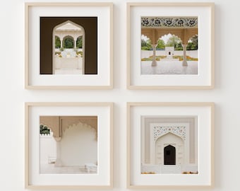 May include: Four framed photographs of architectural details in a white building. Each photo shows a different archway with intricate details and a white background.
