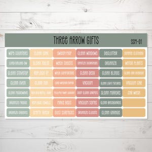 May include: A set of 24 colorful chore stickers with rounded corners. The stickers are organized in a grid with three columns and eight rows. The stickers are labeled with various household chores, such as "Wipe Counters", "Clean Sink", "Sweep/Mop", "Clean Windows", "Declutter", "Donate Clothing", "Load/Unload DW", "Clean Toilet", "Wash Sheets", "Sanitize Doorknobs", "Organize", "Water Plants", "Clean Stovetop", "Replace TP", "Wash Comforters", "Clean Desk", "Clean Blinds", "Clean Car Interior", "Clean Oven", "Clean Tub", "Load Washer/Dryer", "Vacuum", "Clean Light Fixtures", "Vacuum Car", "Clean Microwave", "Replace/Refill Soup", "Fold/Put Away Laundry", "Deep Clean Carpets", "Clean Mirrors", "Car Wash", "Organize Fridge", "Replace Towels", "Make Beds", "Vacuum Sofas", "Clean Baseboards", "Organize Cabinets", "Empty Trash", "Dust Surfaces", "Organize Closets", "Clean Garage". The stickers are printed on a white background with a light gray border.