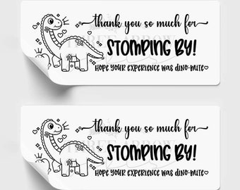 May include: Two black and white printable thank you tags featuring a cartoon dinosaur with the text "Thank you so much for STOMPING BY! Hope your experience was dino-mite."