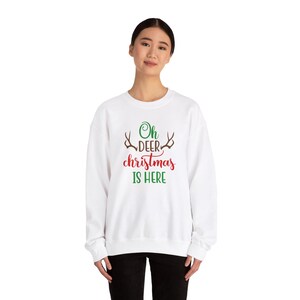 Oh Deer CHRISTMAS IS HERE - Unisex Heavy Blend™ Crewneck Sweatshirt, Christmas Gift, Sweatshirt Gift Gift For Her Cozy Crewneck Festive Gift