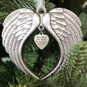 May include: Silver angel wings ornament with a heart-shaped charm that reads "Your Wings were Ready but my Heart was Not".