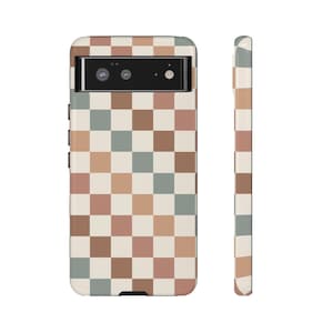 May include: A phone case with a checkered pattern in shades of brown, beige, and blue. The case has a cutout for the camera lens.