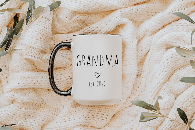 a handmade Ceramic Black Handle White high-quality printing Mug with securely packaging is the best gift for expecting grandma