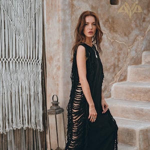 Fabulous Fabric Find - Check out this awesome black see-through dress! This eco-friendly fashion piece is handmade from organically dyed cotton and comes in 4 sizes.