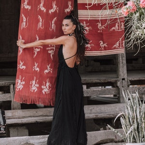 Incorporate a unique tribal aesthetic into your wedding day with this chic minimalistic slip maxi dress.