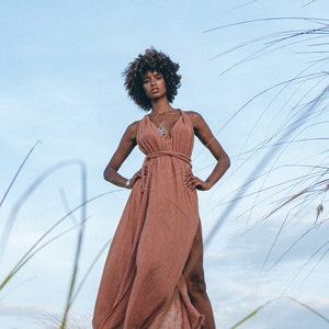 Enhance your femininity with a one-of-a-kind Open Back Cotton Maxi Dress from our new collection – right on trend!