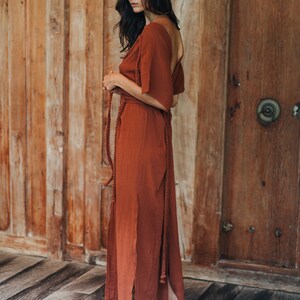 Make a stunning entrance at your next special event in the Red Boho Goddess Nomad Spirit dress.