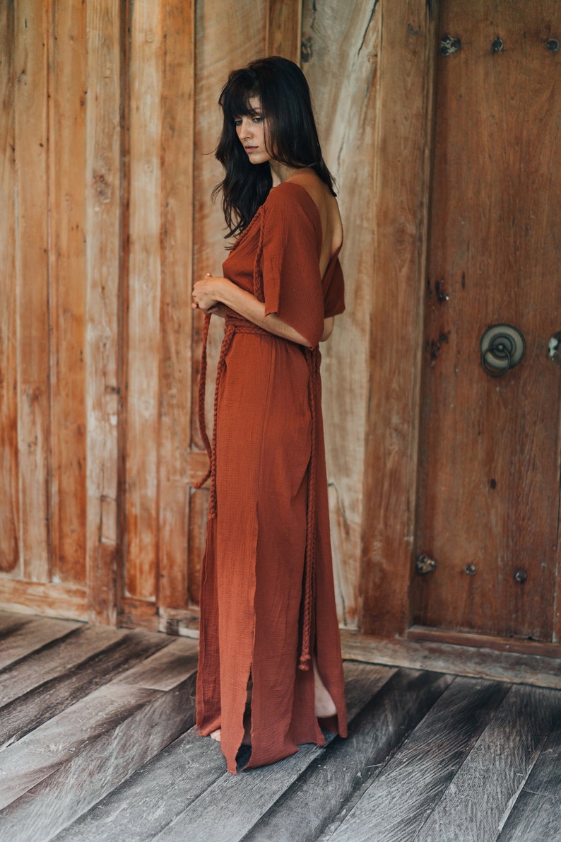 Make a stunning entrance at your next special event in the Red Boho Goddess Nomad Spirit dress.