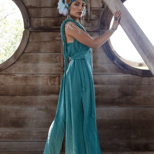 Leave a fashion statement with AYA's organic braided Green Turquoise dress. This incredibly unique, sustainable and adjustable dress for all sizes will make you look and feel like a goddess at any special occasion.