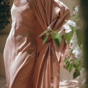 Turn heads at any event in this stunning Rose Dress. Expertly made from organic Ahimsa Silk with botanically dyed fabric, show off your elegance.