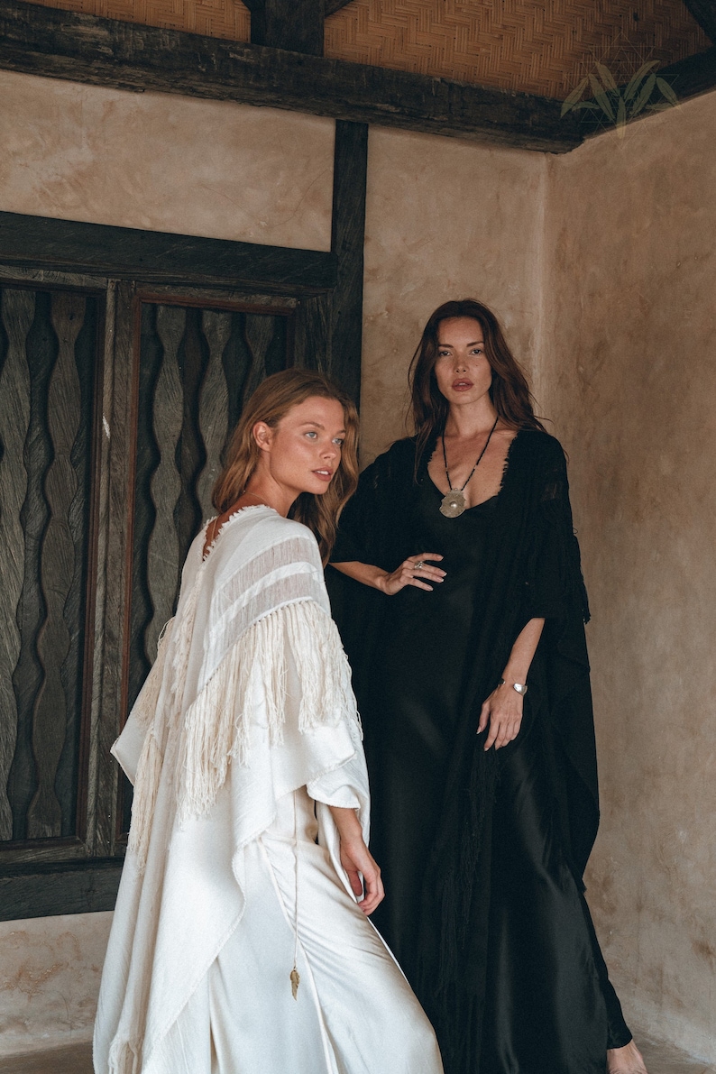 Get ready for the new season with our vegan friendly Bohemian Black Long Poncho perfect for any ceremony.