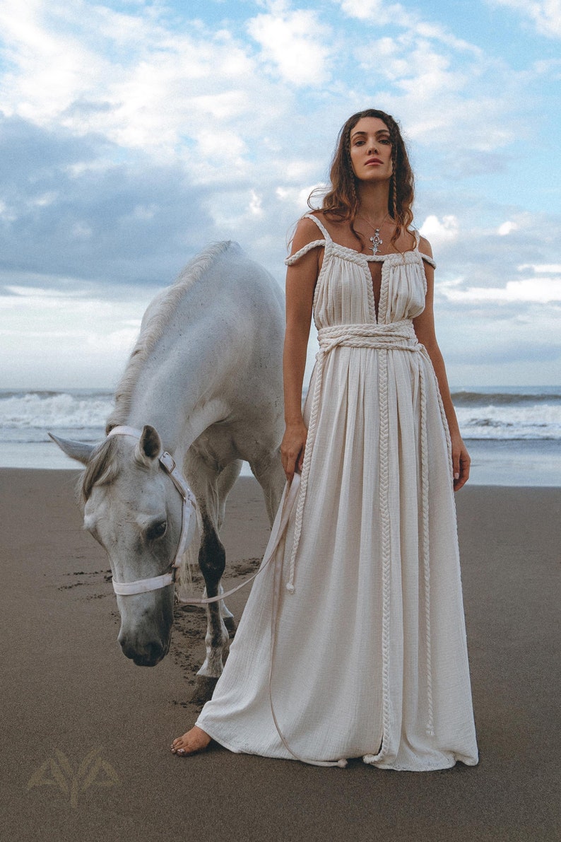 Embrace your individuality with this timeless Bridal Minimalist Dress!